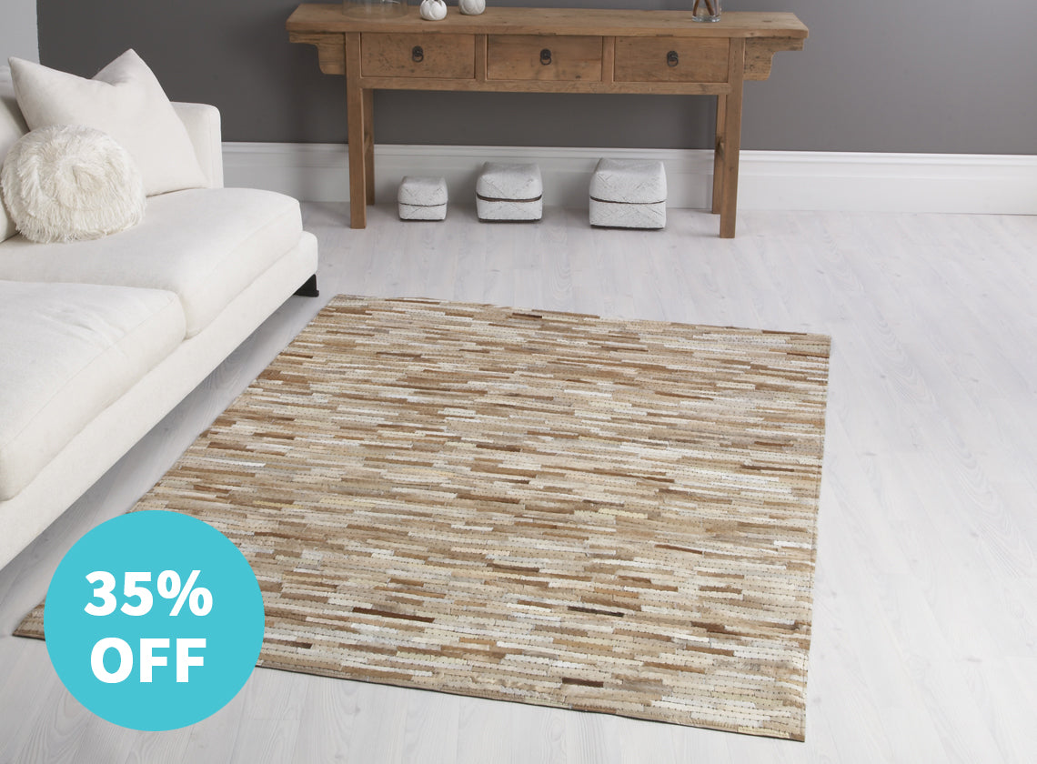Laila Cow Hide Rug in Tan