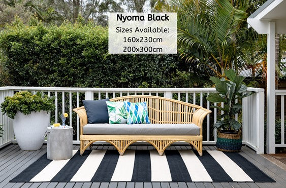 Nyoma Striped Outdoor Rug in Black